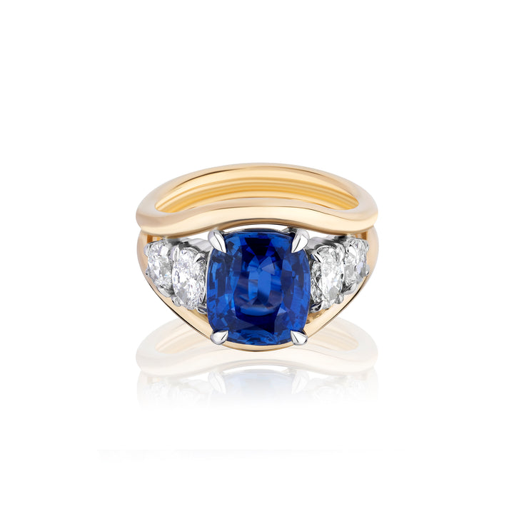 Blue Cushion Sapphire with Oval Diamond Side Stones