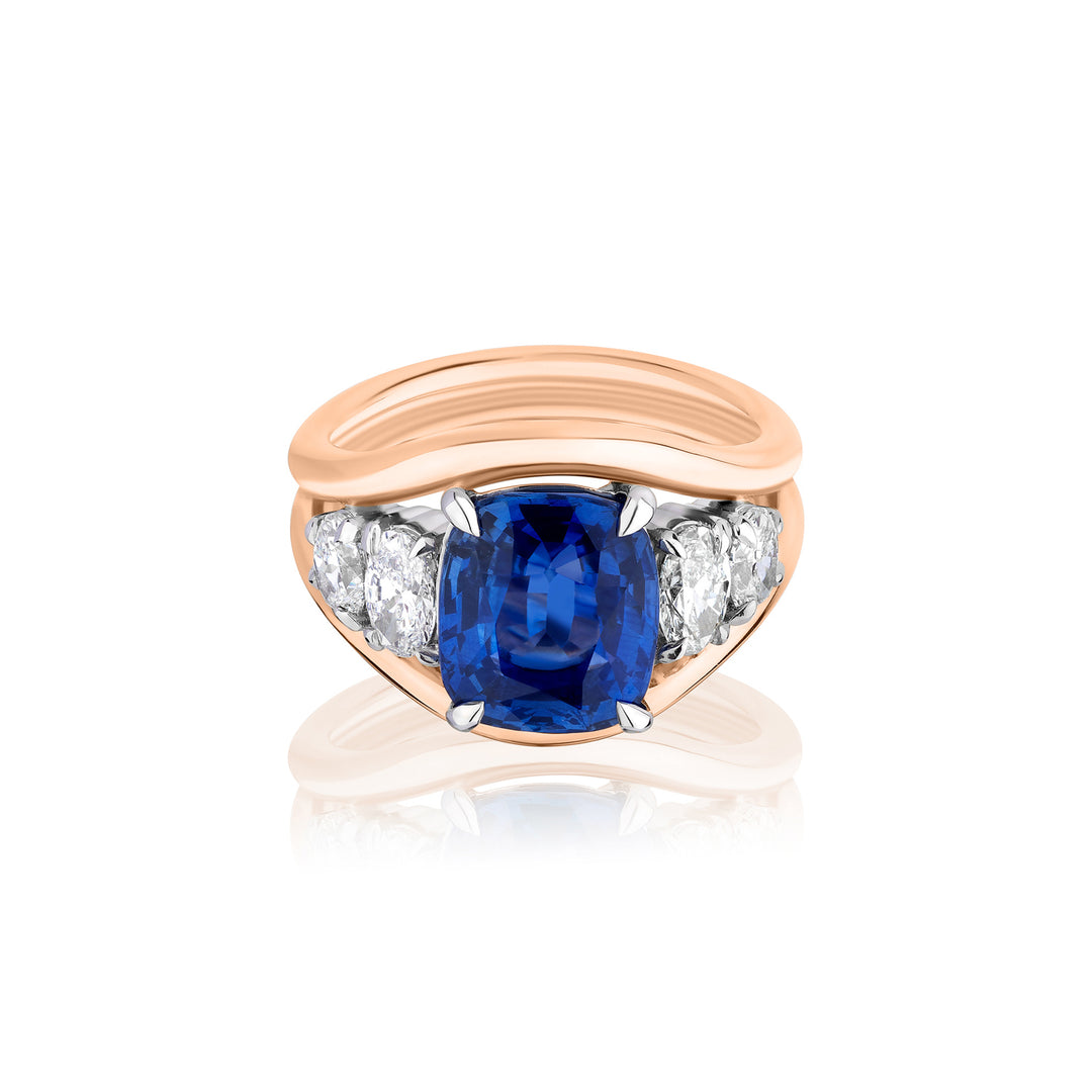 Blue Cushion Sapphire with Oval Diamond Side Stones