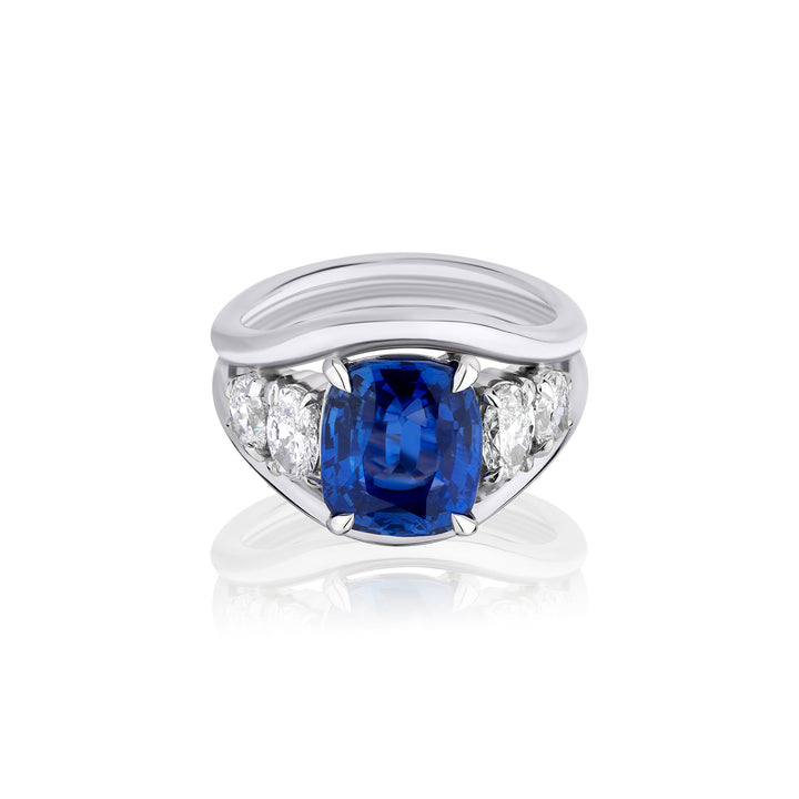 Blue Cushion Sapphire with Oval Diamond Side Stones