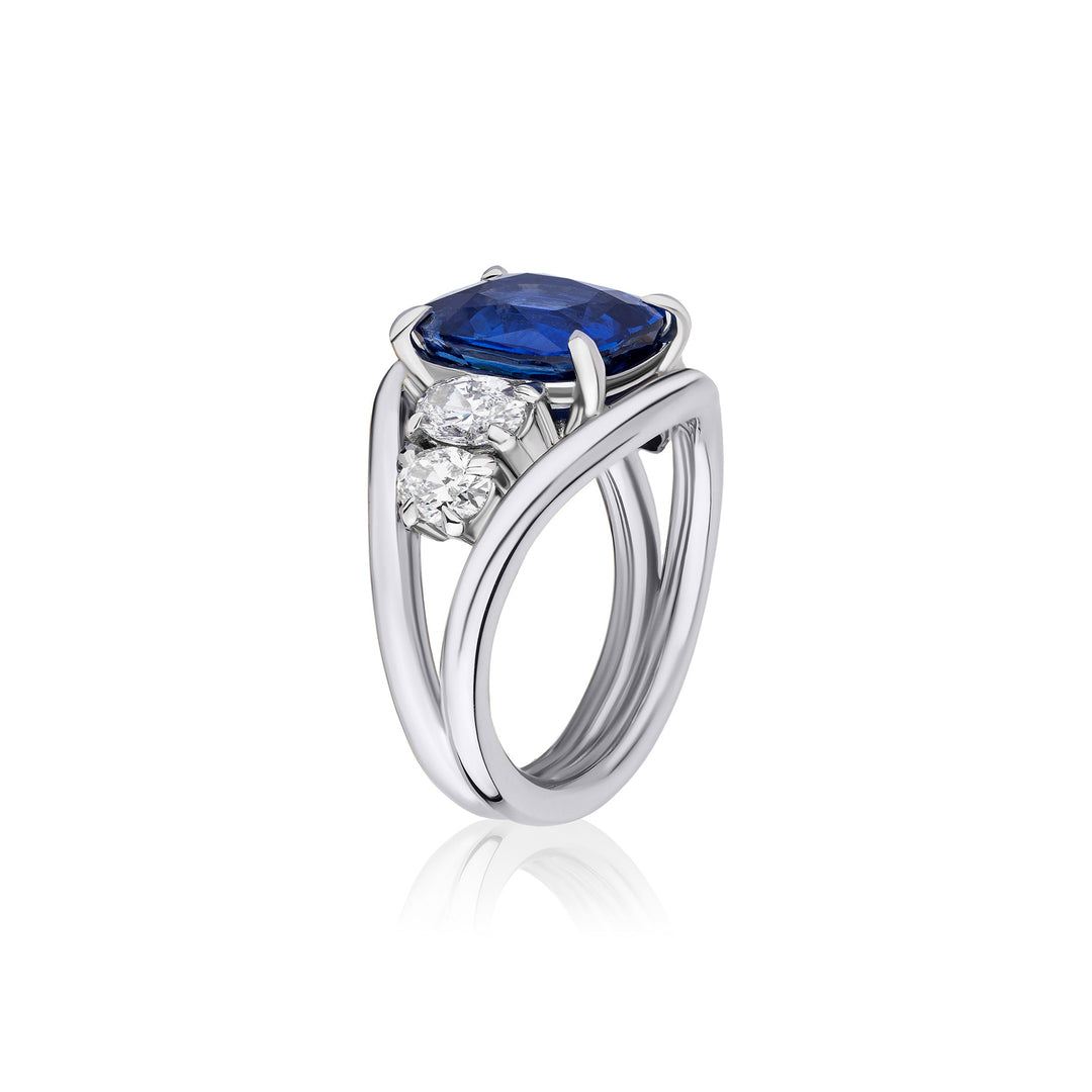 Blue Cushion Sapphire with Oval Diamond Side Stones