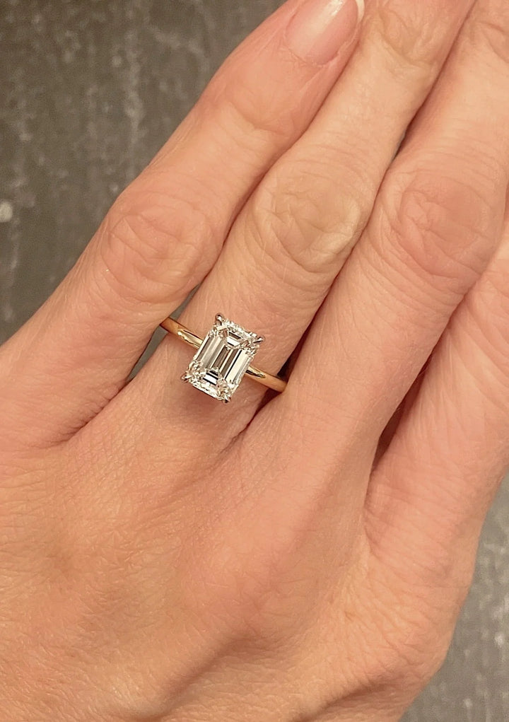 Thin Claw Prong Emerald Cut Ring