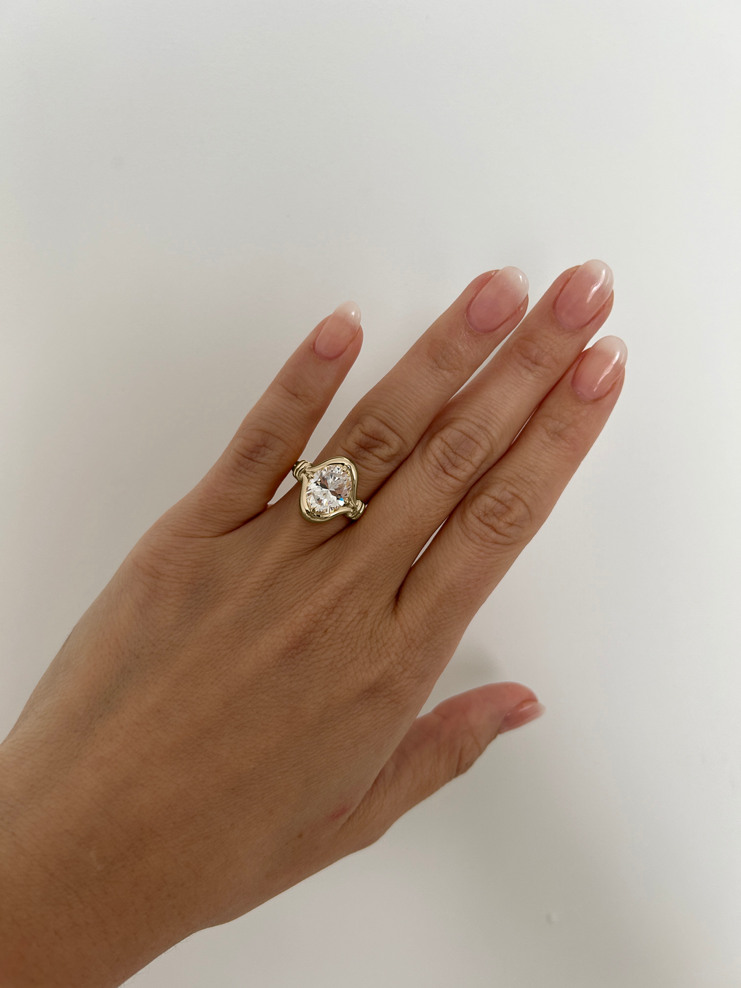 Oval Diamond Bezel Ring with a Double Wrap Side Band