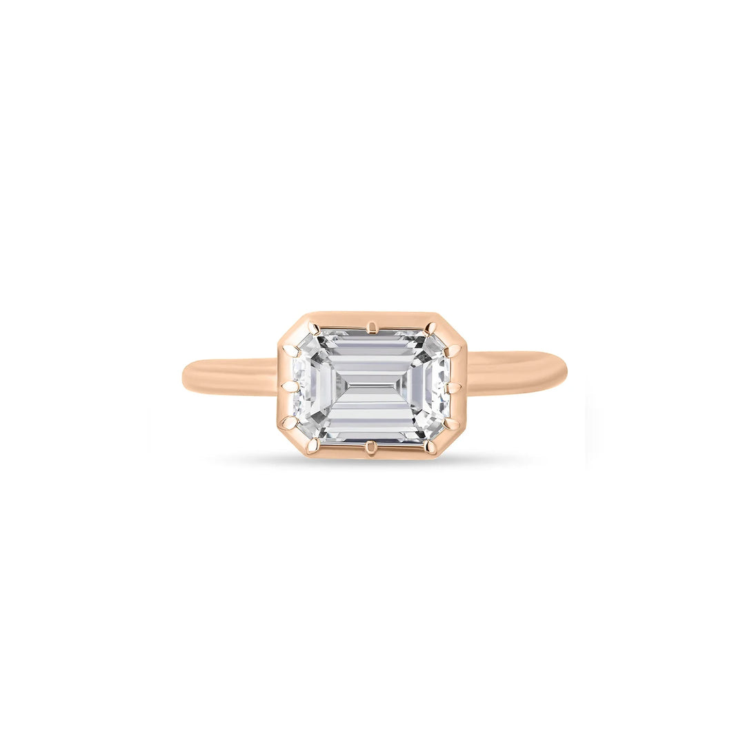 East-West Emerald Cut Bezel Ring